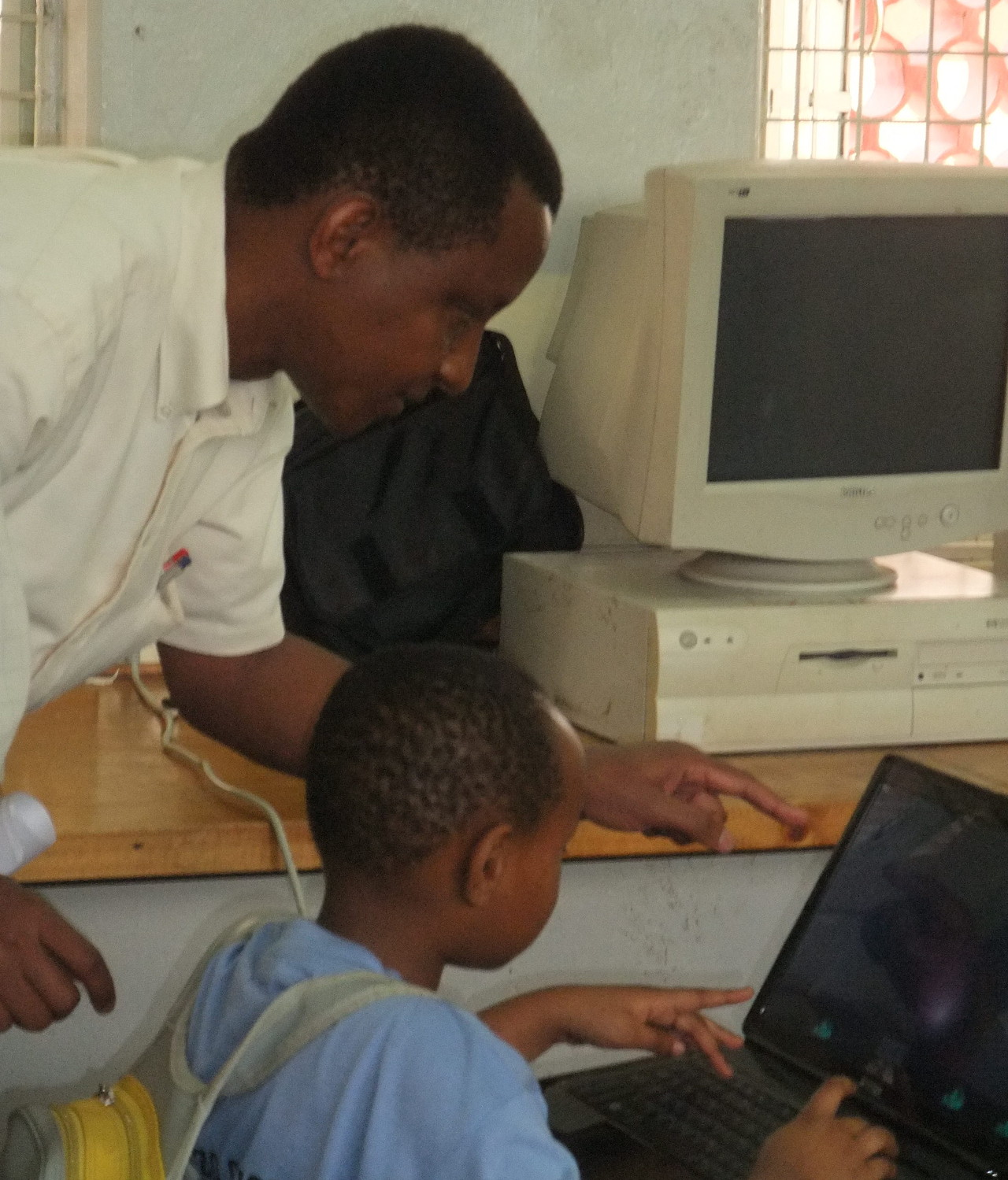 Teacher with young student