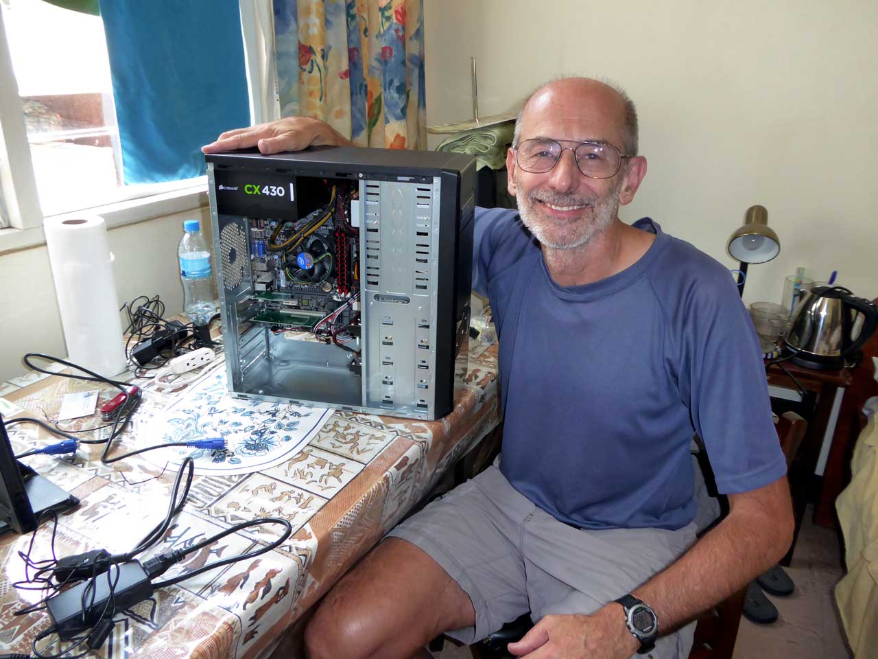 Neal preparing server in Arusha hostel room